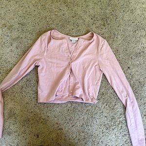 Light pink cropped button up from Topshop the size is a US 4-6 UK S EUR 36-38